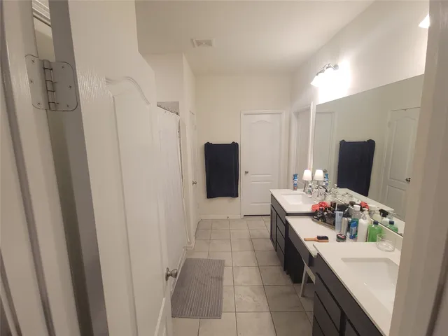 a room with furniture and flat screen tv