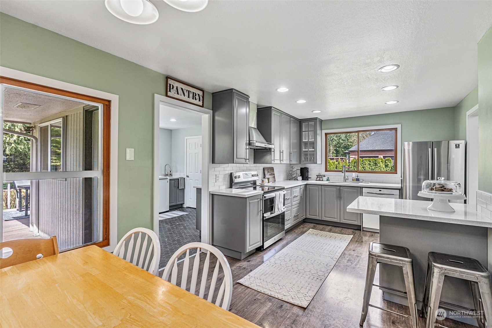 24031 Florence Acres Road Monroe, WA 98272 - Photo 14 of 37 a kitchen with stainless steel appliances granite countertop a sink and cabinets
