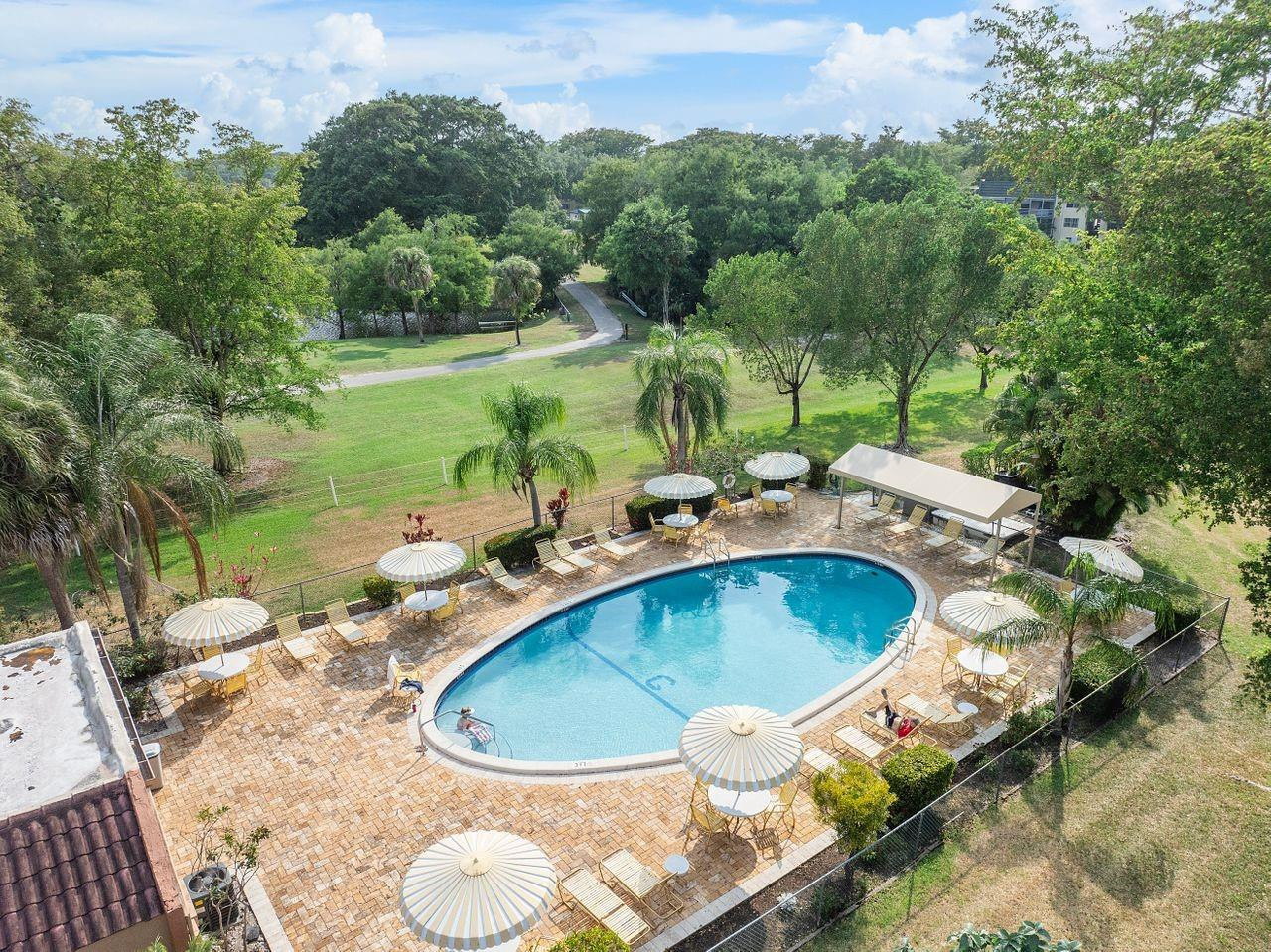 8822 West McNab Road, Unit 201 Tamarac, FL 33321 - Photo 5 of 23 Enjoy your winter home with heated pool.