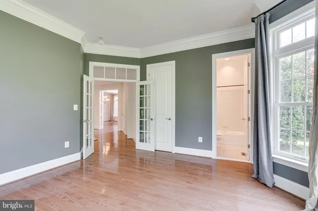 a bathroom with a tub a sink and a shower