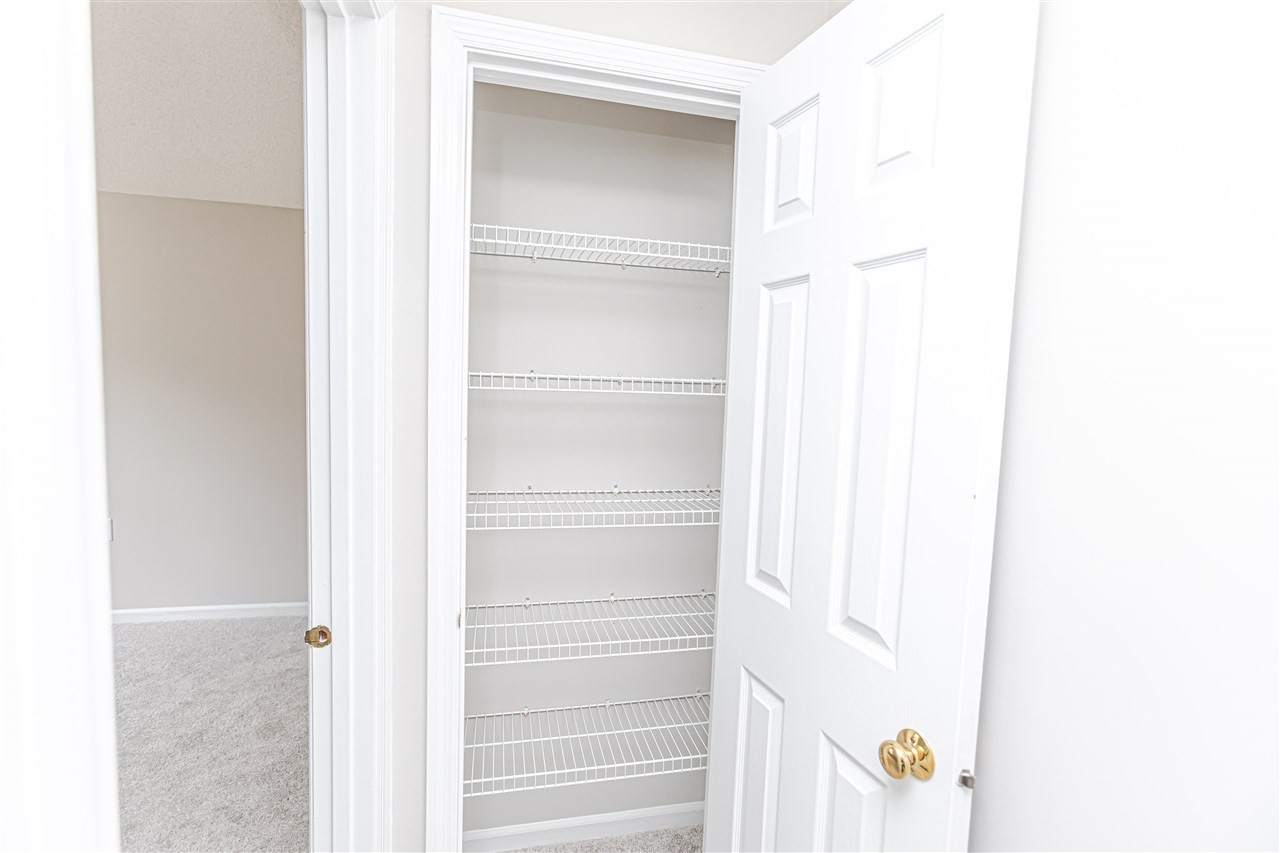 2117 Treverton Place Raleigh, NC 27609 - Photo 23 of 30 Linen Closet