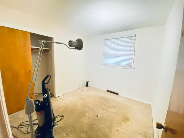 a view of a room with a workspace