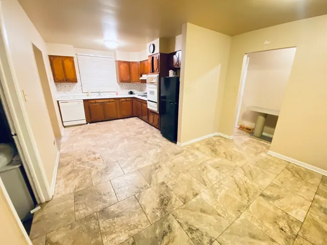 a large bathroom with a sink and a mirror
