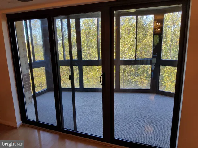 a view of room with a flat screen tv