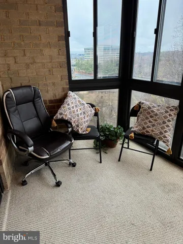 a view of livingroom with hardwood floor and window