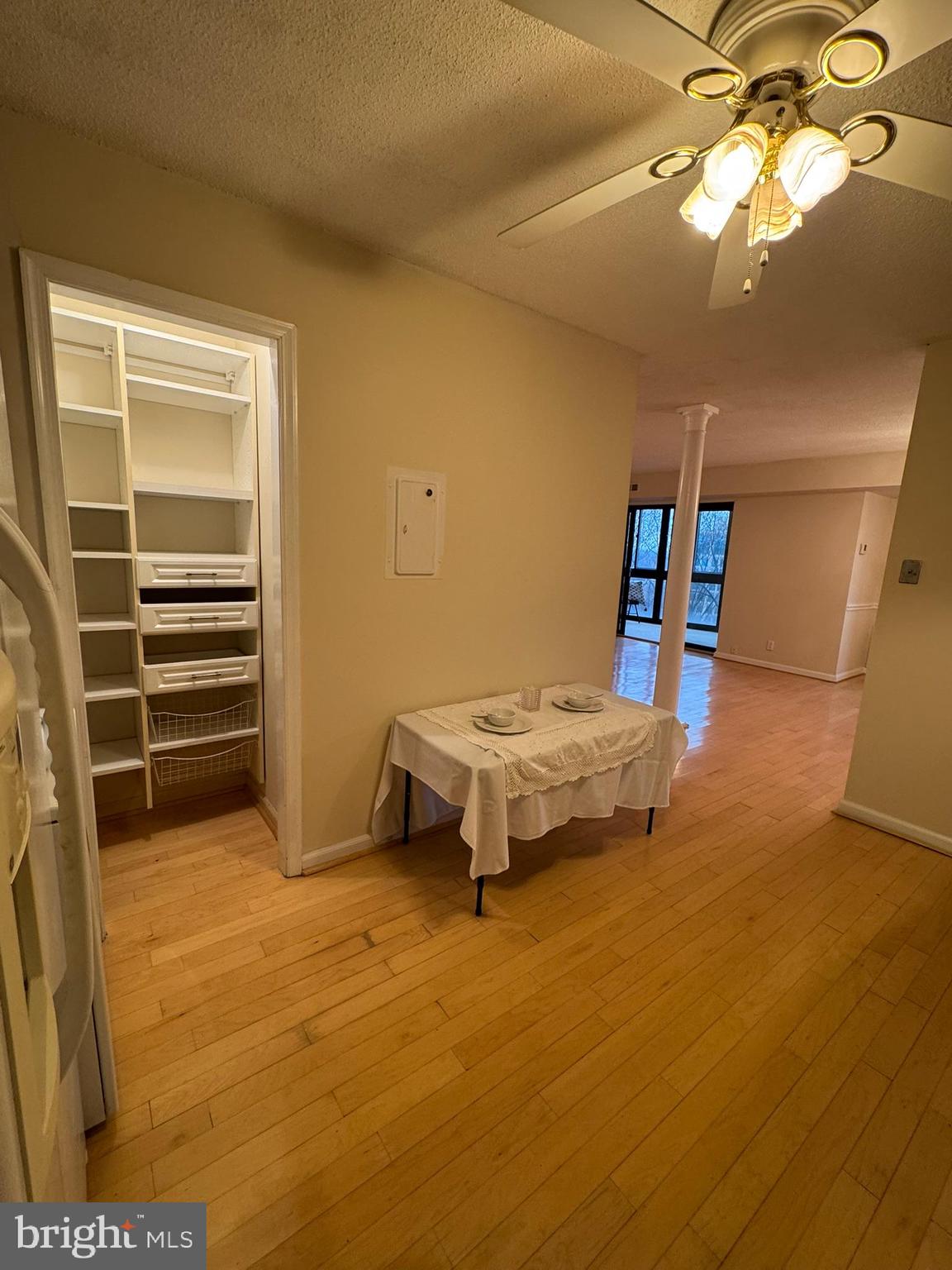 8370 Greensboro Drive, Unit 806 McLean, VA 22102 - Photo 24 of 31 a bedroom with a bed and a chandelier