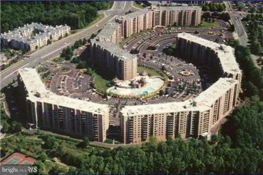 a aerial view of a house with a yard