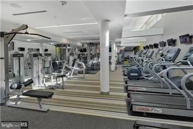 a view of a swimming pool and a chairs