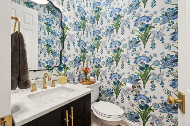 a bedroom with furniture and flat screen tv