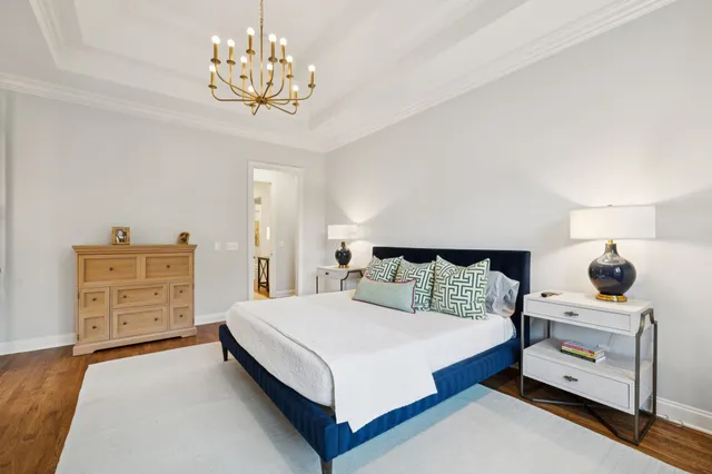 a bathroom with a sink a window and a mirror