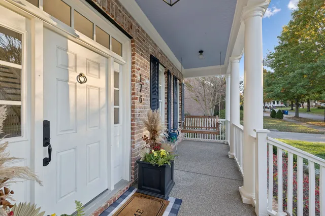 front view of a house with a garden