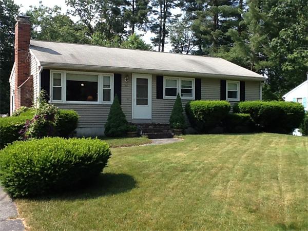 32 Haskell Road Pepperell, MA 01463 - Photo 1 of 18 a view of a house with a garden