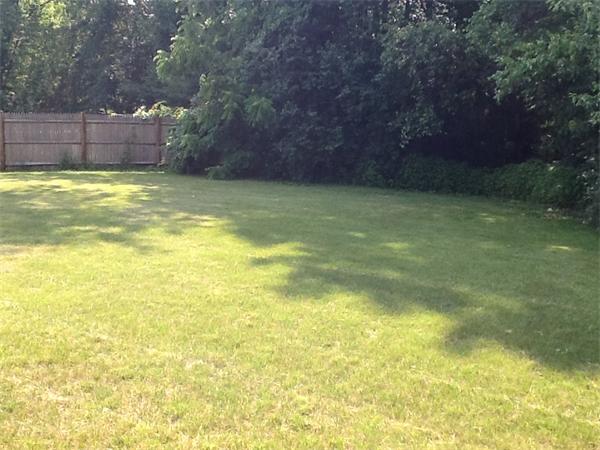 32 Haskell Road Pepperell, MA 01463 - Photo 14 of 18 a view of a swimming pool and a yard