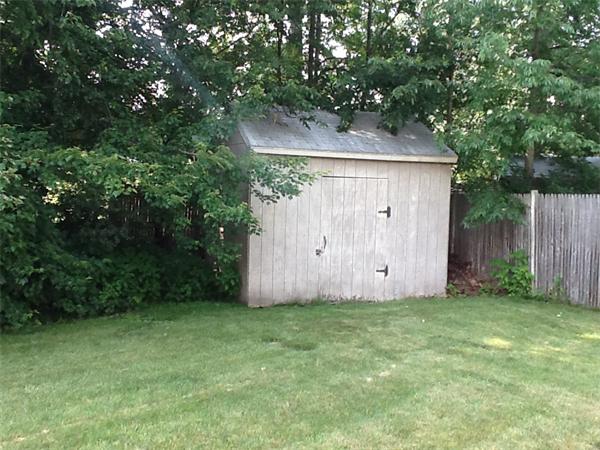 32 Haskell Road Pepperell, MA 01463 - Photo 16 of 18 a view of backyard with a barn and a cactus plant