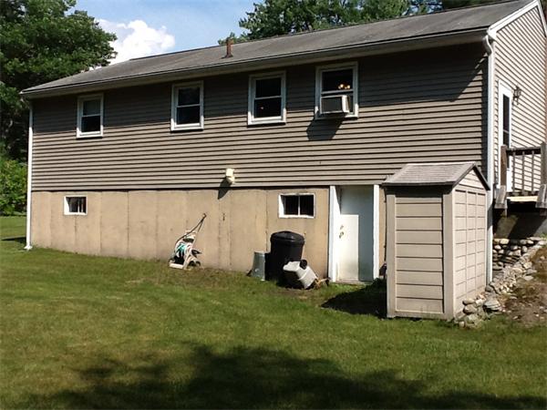 32 Haskell Road Pepperell, MA 01463 - Photo 2 of 18 a view of a house with a yard