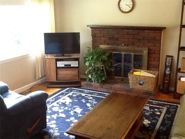 32 Haskell Road Pepperell, MA 01463 - Photo 3 of 18 a living room with furniture and a flat screen tv
