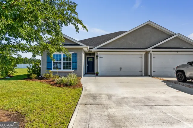 a house view with a garden space