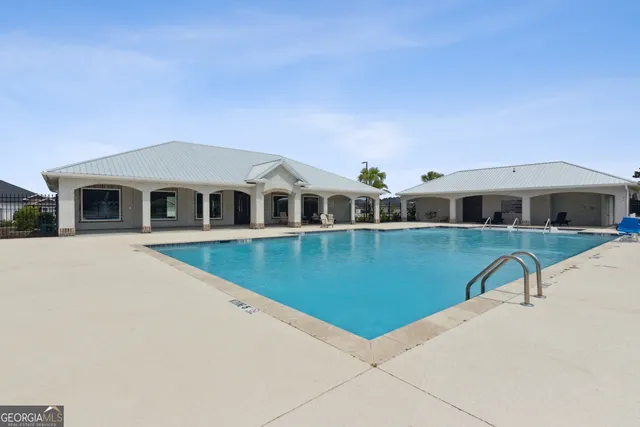 a view of house with outdoor space and yard