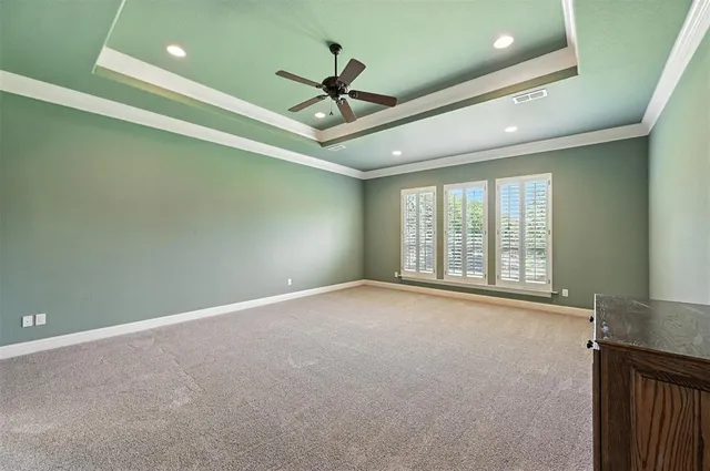 a view of an empty room with a fireplace