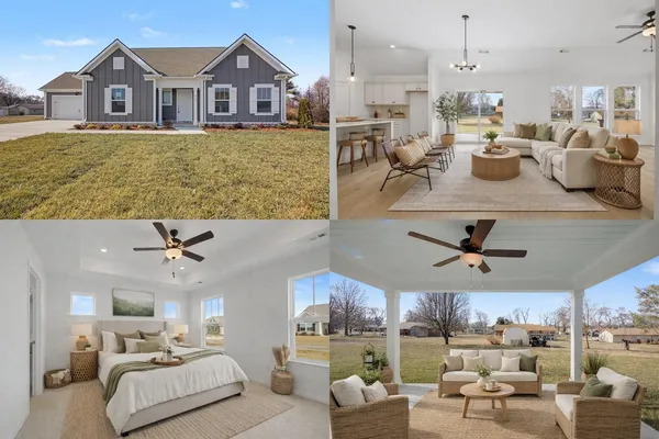 a living room with lots of furniture and a large window