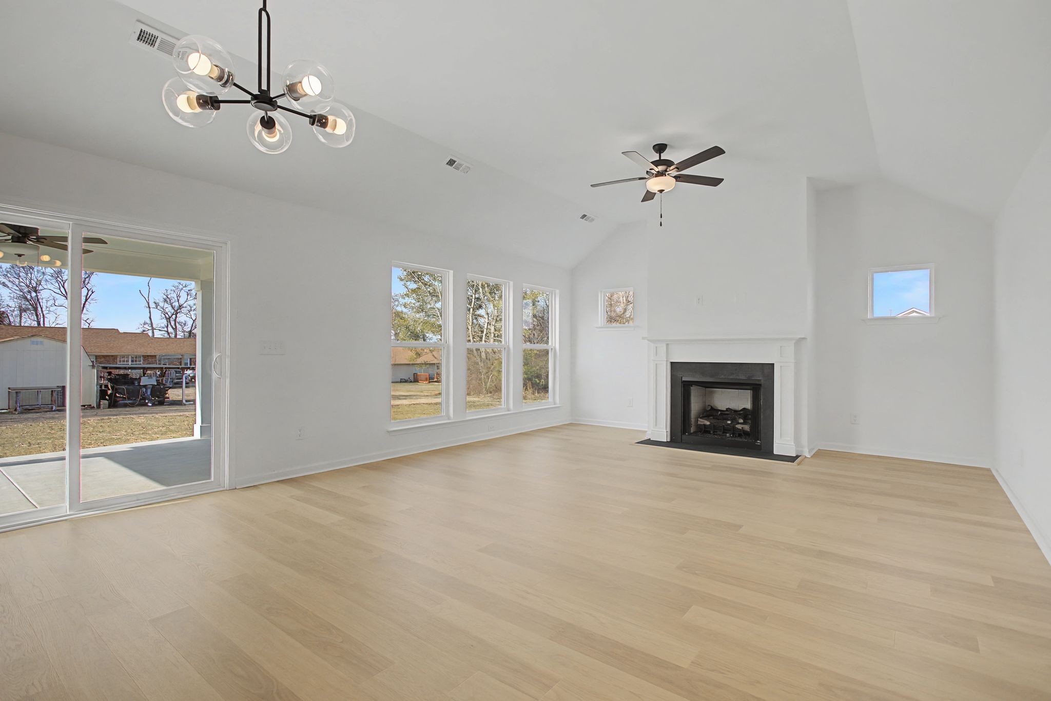 614 Brookside Drive Mount Pleasant, TN 38474 - Photo 12 of 41 an empty room with fan and windows