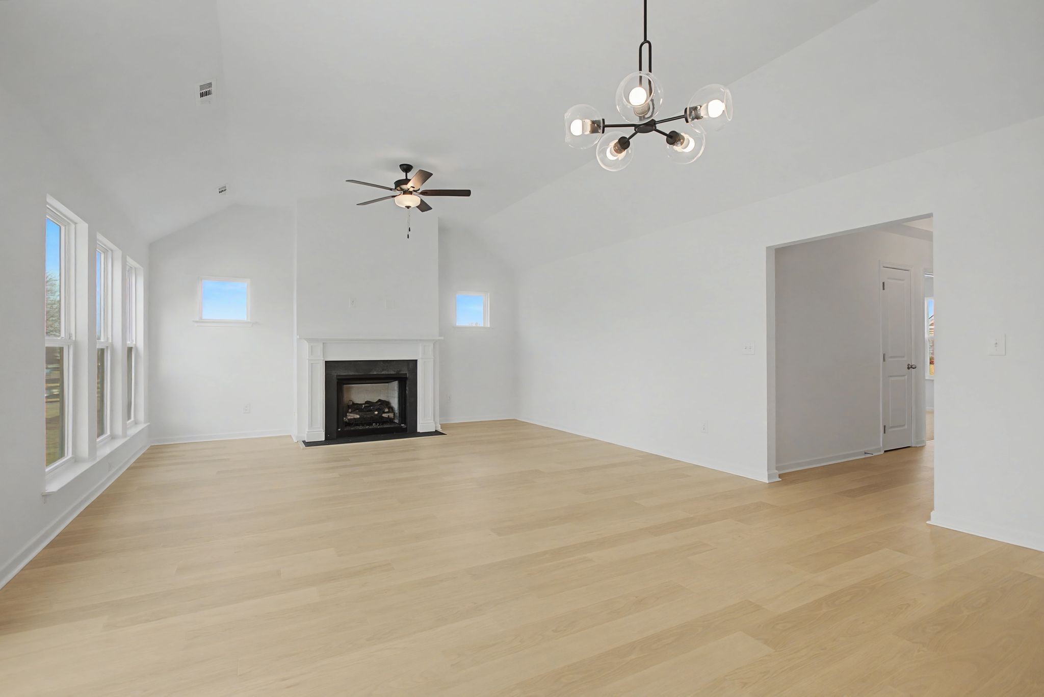 614 Brookside Drive Mount Pleasant, TN 38474 - Photo 13 of 41 a view of an empty room with a fireplace