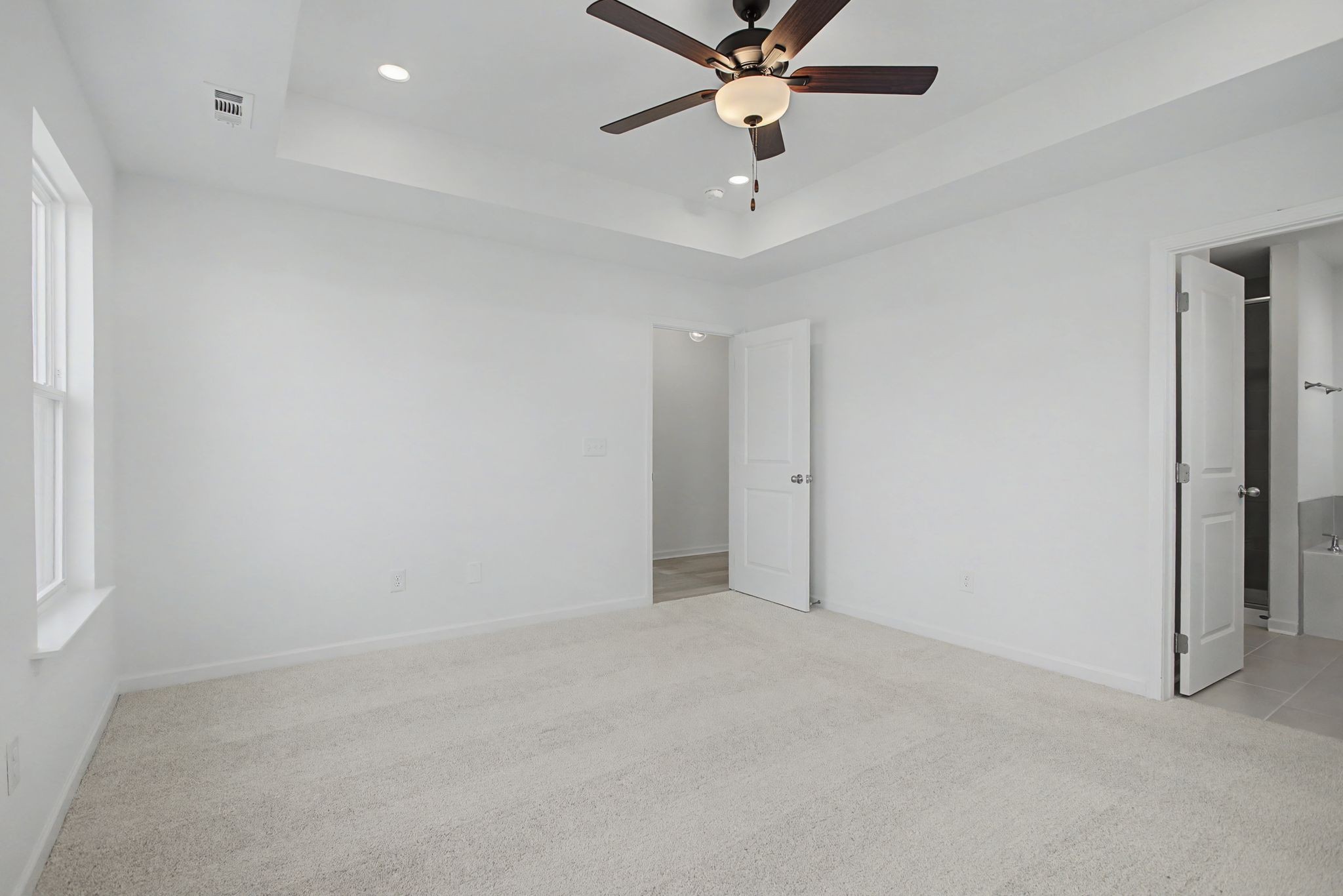 614 Brookside Drive Mount Pleasant, TN 38474 - Photo 24 of 41 an empty room with a empty space and a ceiling fan