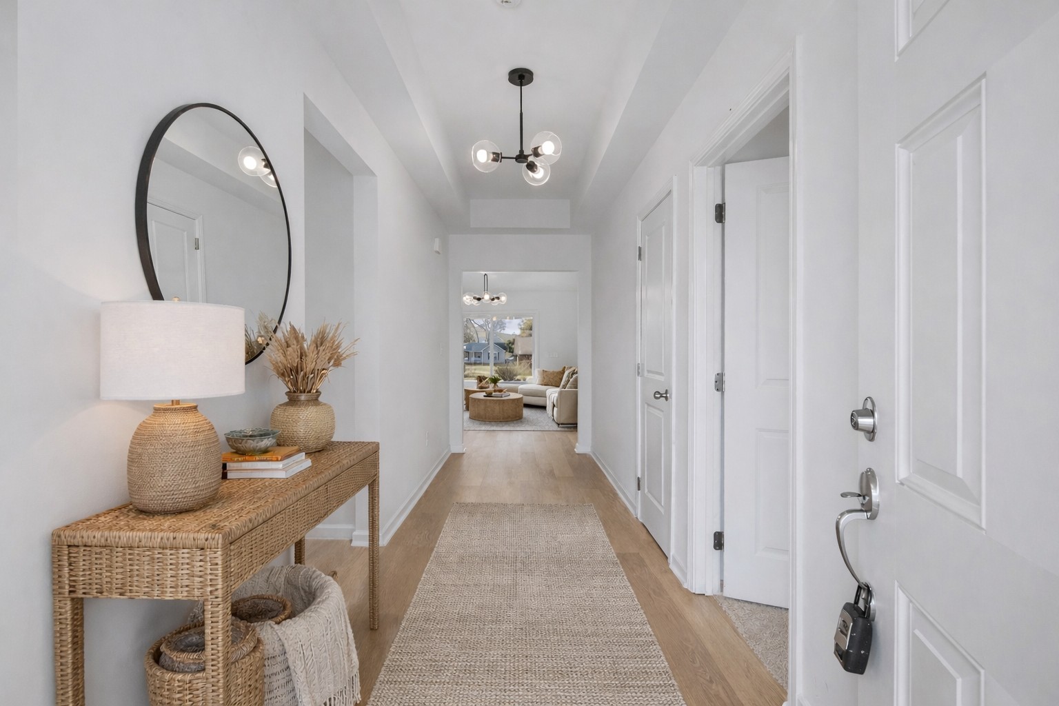 614 Brookside Drive Mount Pleasant, TN 38474 - Photo 7 of 41 a hallway with furniture and a chandelier