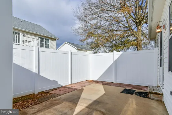 a view of a house with a snow in the yard