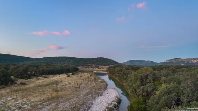 a view of mountains and valleys