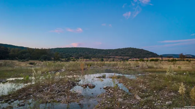 a view of lake with mountain