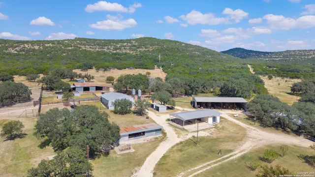 a view of a lake with couches and city view