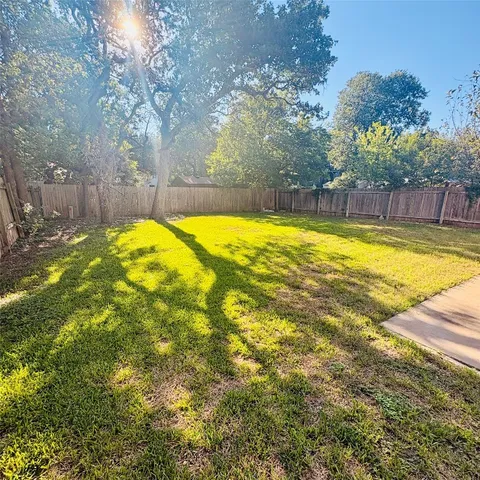 a view of a swimming pool with an outdoor space and seating area