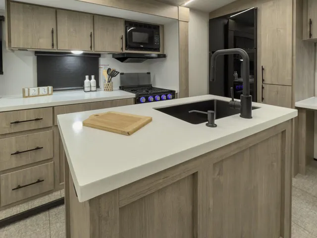 a picture of a bathroom with a sink and a mirror