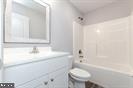 Plum Tree Lane Berkeley Springs, WV 25411 - Photo 11 of 18 a bathroom with a bathtub and a toilet