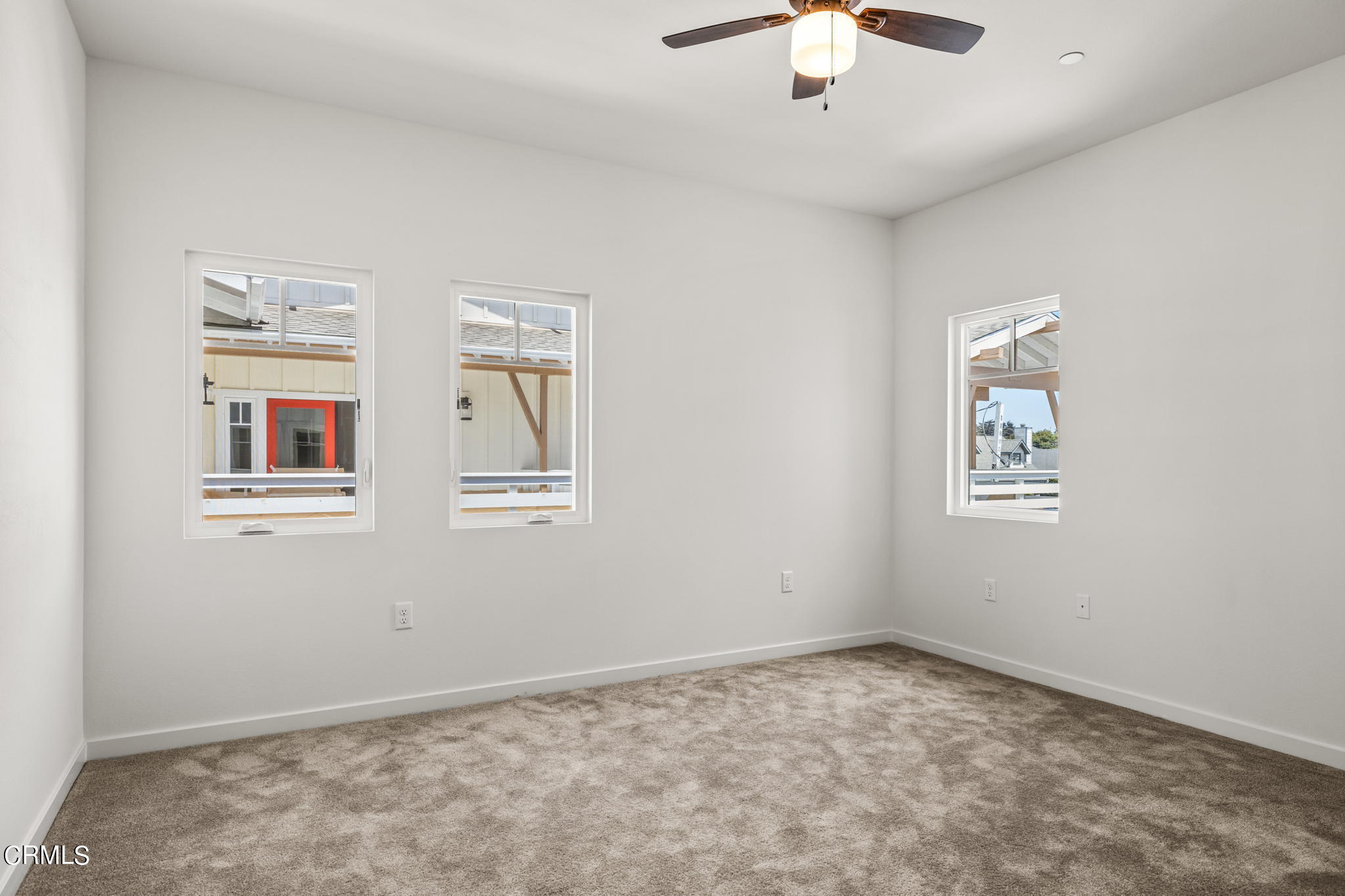 311 North F Street, Unit 202 Oxnard, CA 93030 - Photo 19 of 32 a view of an empty room with a window