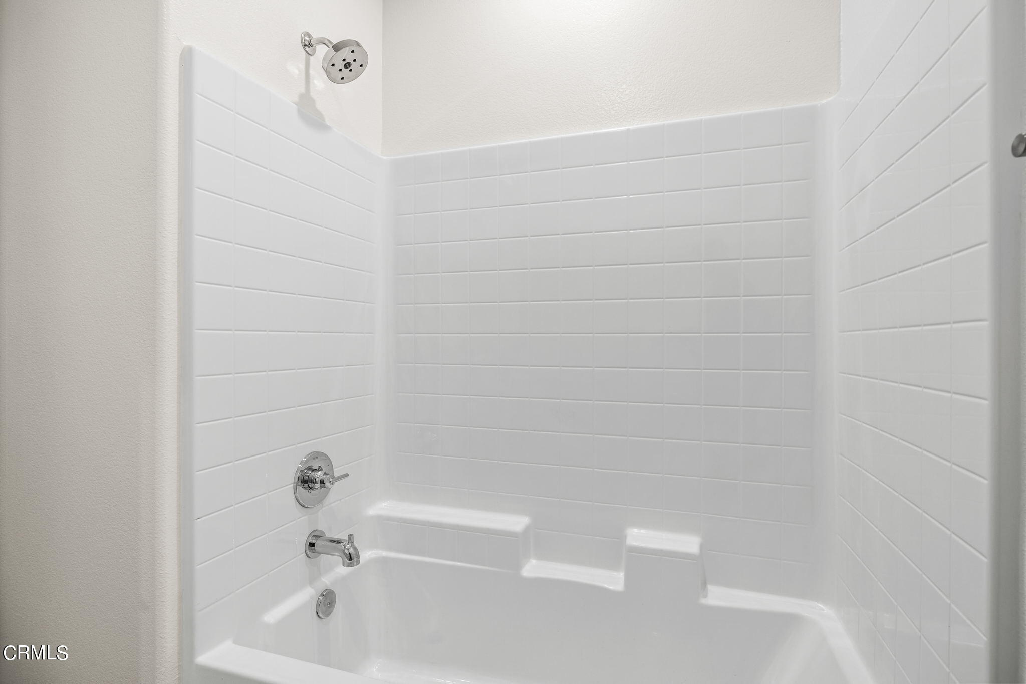 311 North F Street, Unit 202 Oxnard, CA 93030 - Photo 22 of 32 a bathroom with a bathtub