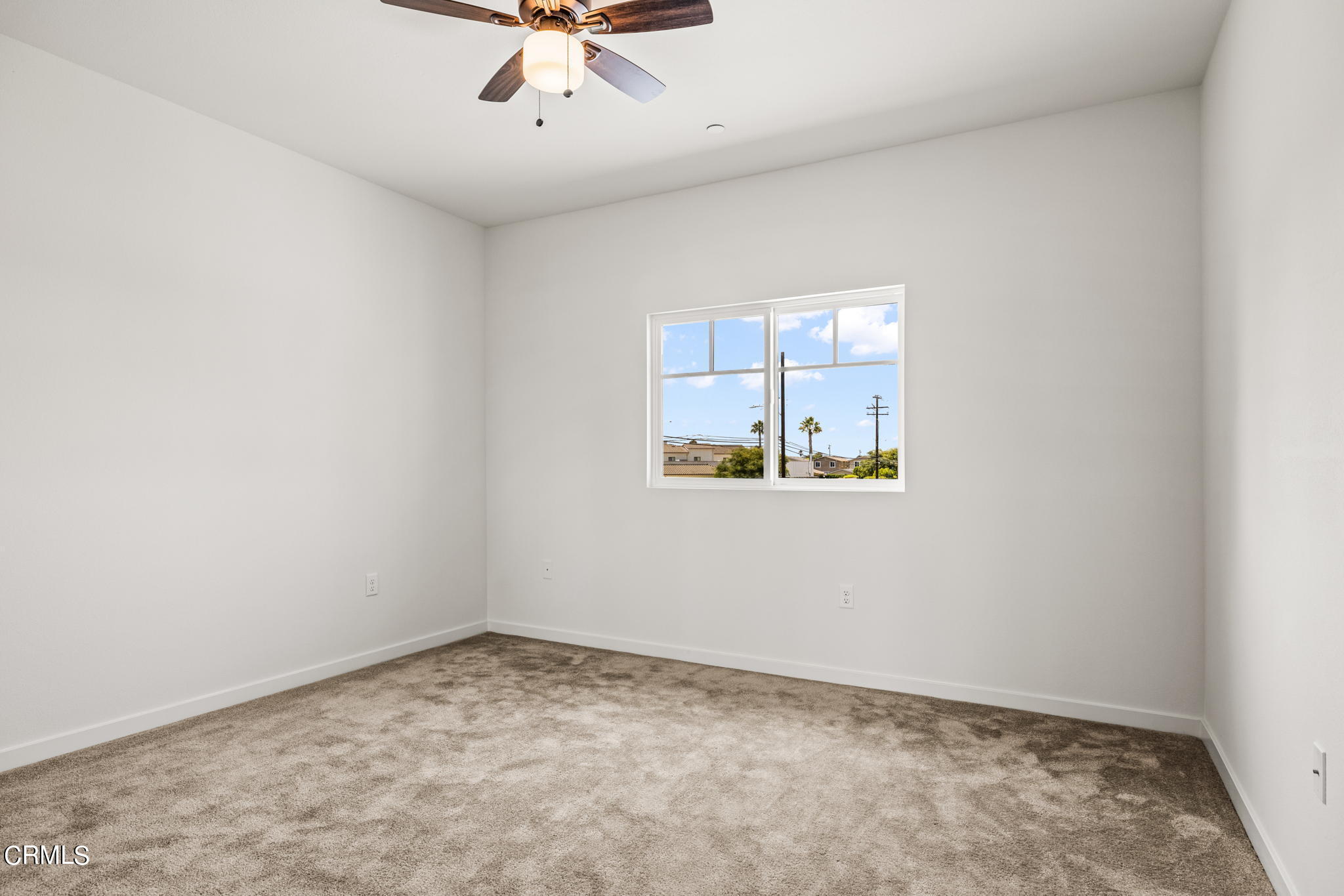 311 North F Street, Unit 202 Oxnard, CA 93030 - Photo 24 of 32 an empty room with a window