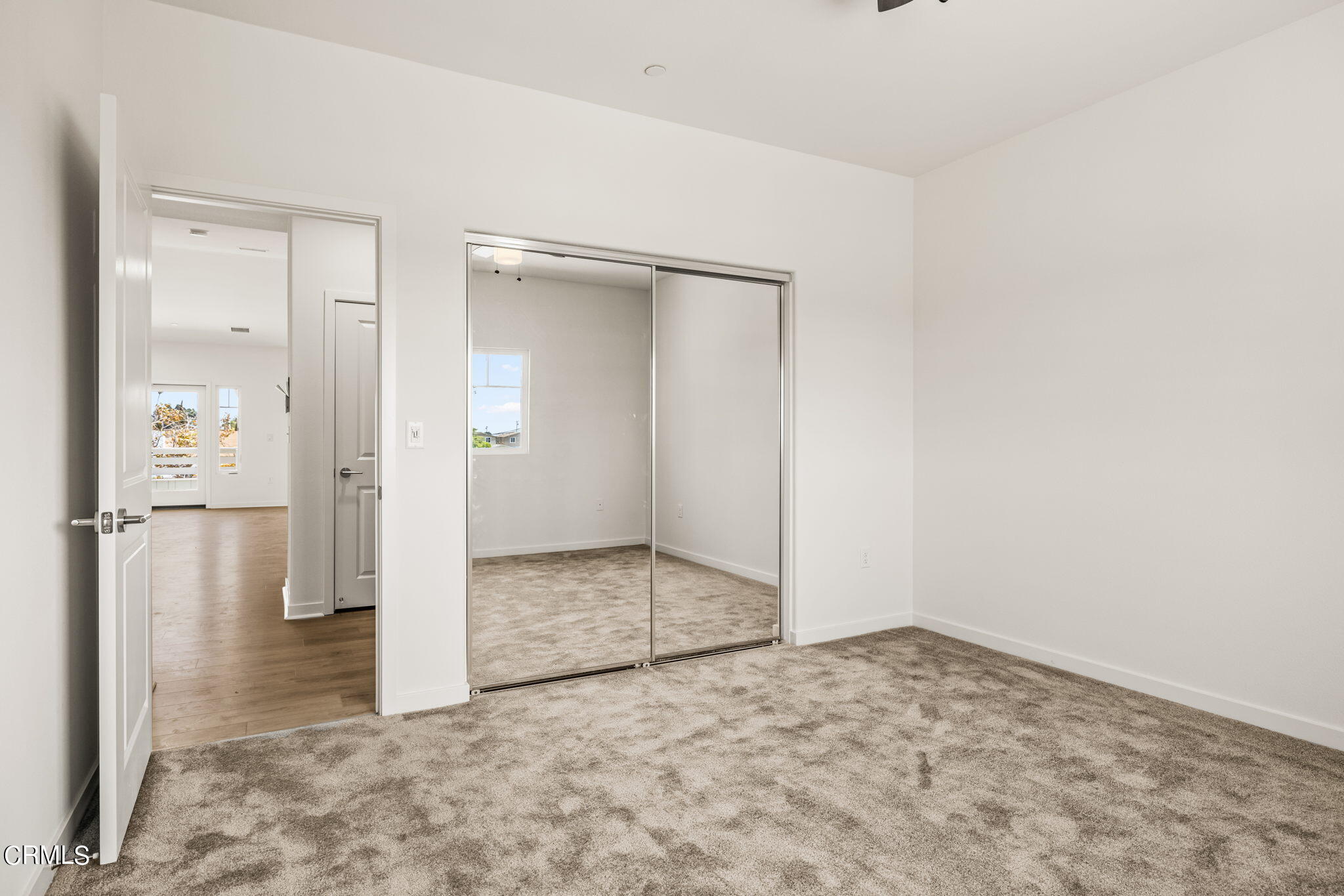 311 North F Street, Unit 202 Oxnard, CA 93030 - Photo 25 of 32 an empty room with closet area