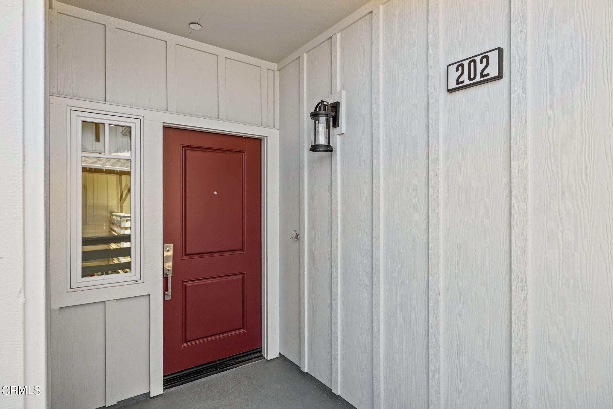 311 North F Street, Unit 202 Oxnard, CA 93030 - Photo 4 of 32 a view of a hallway with elevator