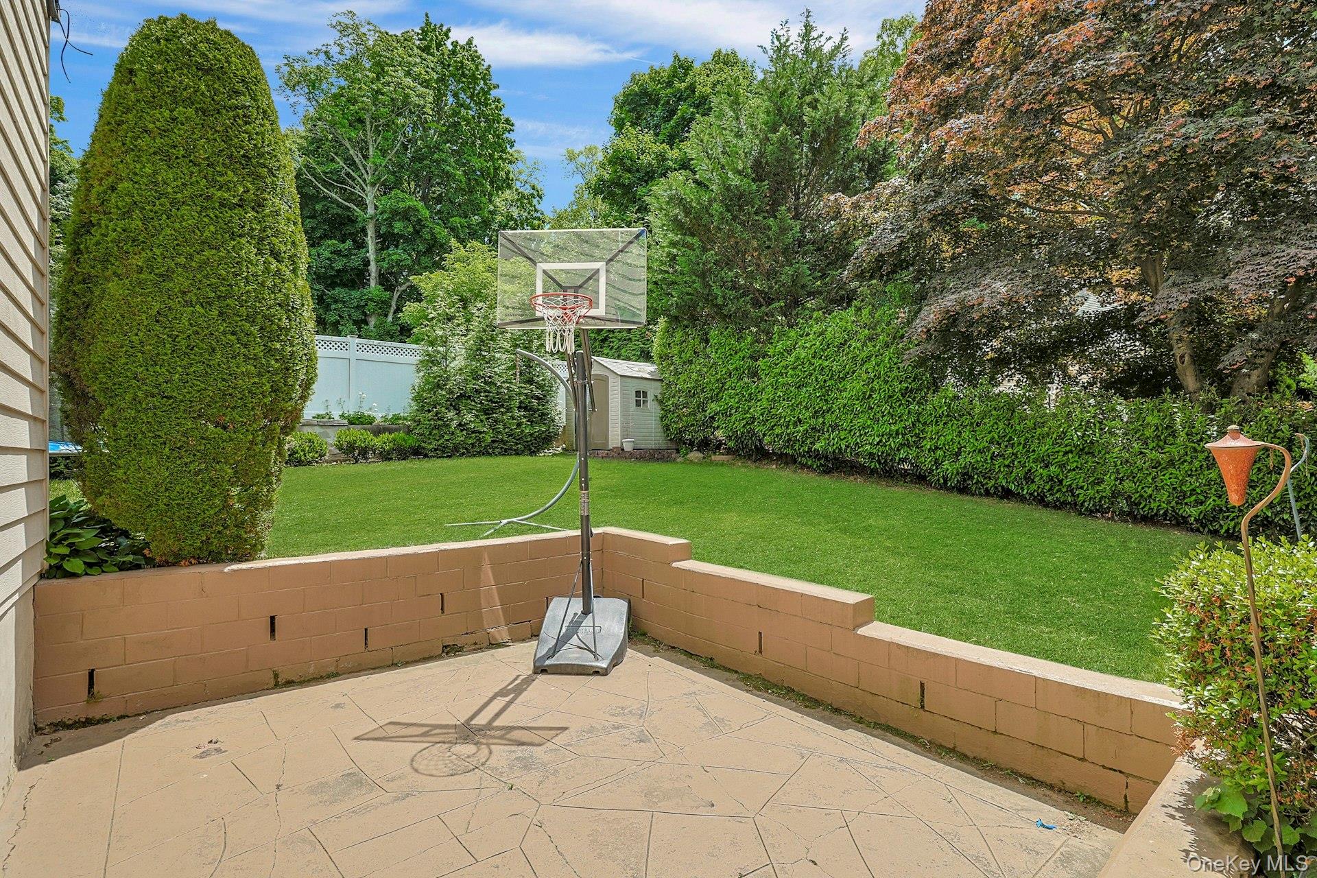 70 Durham Road White Plains, NY 10607 - Photo 24 of 32 Side Patio Off Family Room