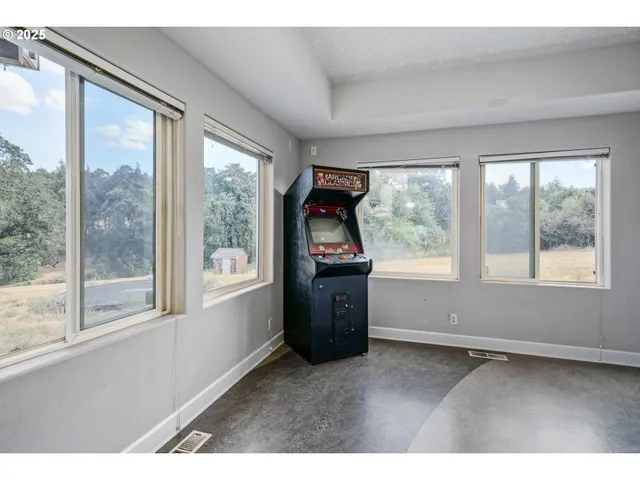 a kitchen that has a lot of windows