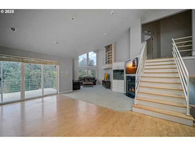 a view of a living room and entryway