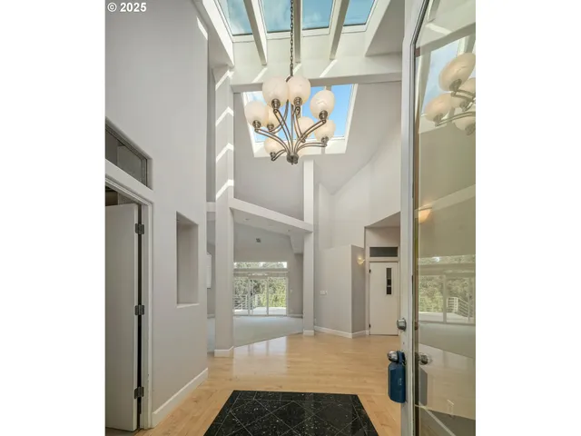 a view of an empty room with windows