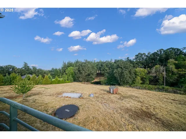 a balcony with view of living room