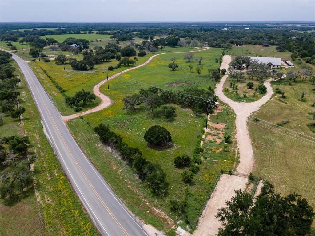 an aerial view of a golf course with outdoor space