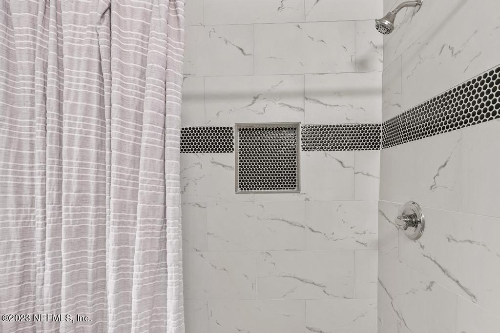 2142 Benedict Road Jacksonville, FL 32209 - Photo 23 of 34 a bathroom with a shower