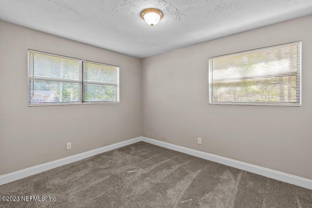 2142 Benedict Road Jacksonville, FL 32209 - Photo 27 of 34 an empty room with a window