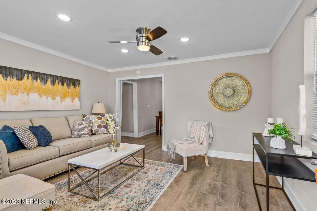 2142 Benedict Road Jacksonville, FL 32209 - Photo 6 of 34 a living room with furniture and a large window