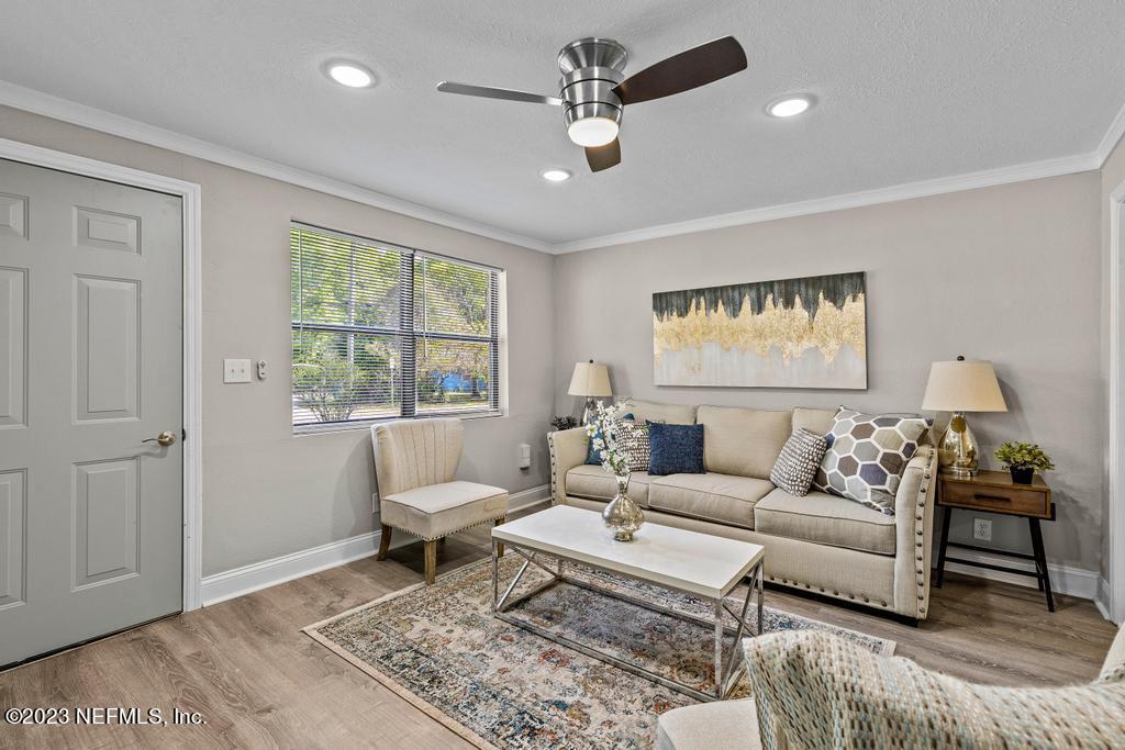 2142 Benedict Road Jacksonville, FL 32209 - Photo 8 of 34 a living room with furniture and a large window